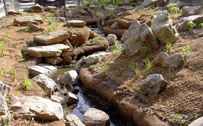 BioD-Block coir block system installed along a streambank for erosion control